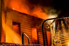 A two-alarm fire broke out at 37 Garnet St., Brooklyn, around 12:30 a.m. on Thu., May 6, 2021. Fire spread throughout the two-story dwelling and extended to the building next door. The fire took over an hour to bring under control, and its cause was under investigation.