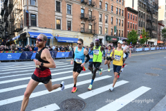 The running of the 50th Anniversary of the New York City Marathon 11/7/21. Thirty thousand runners took to the streets of the 5 boroughs, down from the fifty thousand pre covid. The joy on the faces reflects the end of a long year of covid restrictions.  Copyright Jon Simon .
