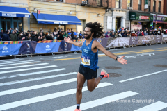 The running of the 50th Anniversary of the New York City Marathon 11/7/21. Thirty thousand runners took to the streets of the 5 boroughs, down from the fifty thousand pre covid. The joy on the faces reflects the end of a long year of covid restrictions.  Copyright Jon Simon .
