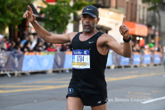 The running of the 50th Anniversary of the New York City Marathon 11/7/21. Thirty thousand runners took to the streets of the 5 boroughs, down from the fifty thousand pre covid. The joy on the faces reflects the end of a long year of covid restrictions.  Copyright Jon Simon .