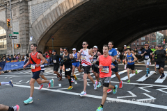 The running of the 50th Anniversary of the New York City Marathon 11/7/21. Thirty thousand runners took to the streets of the 5 boroughs, down from the fifty thousand pre covid. The joy on the faces reflects the end of a long year of covid restrictions.  Copyright Jon Simon .
