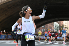 The running of the 50th Anniversary of the New York City Marathon 11/7/21. Thirty thousand runners took to the streets of the 5 boroughs, down from the fifty thousand pre covid. The joy on the faces reflects the end of a long year of covid restrictions.  Copyright Jon Simon .