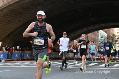 The running of the 50th Anniversary of the New York City Marathon 11/7/21. Thirty thousand runners took to the streets of the 5 boroughs, down from the fifty thousand pre covid. The joy on the faces reflects the end of a long year of covid restrictions.  Copyright Jon Simon .