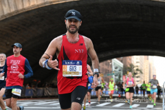 The running of the 50th Anniversary of the New York City Marathon 11/7/21. Thirty thousand runners took to the streets of the 5 boroughs, down from the fifty thousand pre covid. The joy on the faces reflects the end of a long year of covid restrictions.  Copyright Jon Simon .