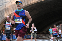The running of the 50th Anniversary of the New York City Marathon 11/7/21. Thirty thousand runners took to the streets of the 5 boroughs, down from the fifty thousand pre covid. The joy on the faces reflects the end of a long year of covid restrictions.  Copyright Jon Simon .