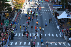 The running of the 50th Anniversary of the New York City Marathon 11/7/21. Thirty thousand runners took to the streets of the 5 boroughs, down from the fifty thousand pre covid. The joy on the faces reflects the end of a long year of covid restrictions.  Copyright Jon Simon .