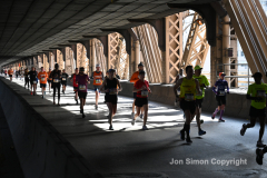 The running of the 50th Anniversary of the New York City Marathon 11/7/21. Thirty thousand runners took to the streets of the 5 boroughs, down from the fifty thousand pre covid. The joy on the faces reflects the end of a long year of covid restrictions.  Copyright Jon Simon .