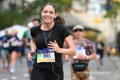 The running of the 50th Anniversary of the New York City Marathon 11/7/21. Thirty thousand runners took to the streets of the 5 boroughs, down from the fifty thousand pre covid. The joy on the faces reflects the end of a long year of covid restrictions.  Copyright Jon Simon .