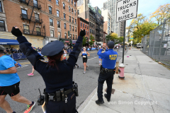 The running of the 50th Anniversary of the New York City Marathon 11/7/21. Thirty thousand runners took to the streets of the 5 boroughs, down from the fifty thousand pre covid. The joy on the faces reflects the end of a long year of covid restrictions.  Copyright Jon Simon .