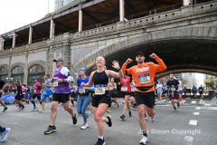 The running of the 50th Anniversary of the New York City Marathon 11/7/21. Thirty thousand runners took to the streets of the 5 boroughs, down from the fifty thousand pre covid. The joy on the faces reflects the end of a long year of covid restrictions.  Copyright Jon Simon .