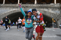 The running of the 50th Anniversary of the New York City Marathon 11/7/21. Thirty thousand runners took to the streets of the 5 boroughs, down from the fifty thousand pre covid. The joy on the faces reflects the end of a long year of covid restrictions.  Copyright Jon Simon .