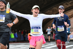 The running of the 50th Anniversary of the New York City Marathon 11/7/21. Thirty thousand runners took to the streets of the 5 boroughs, down from the fifty thousand pre covid. The joy on the faces reflects the end of a long year of covid restrictions.  Copyright Jon Simon .