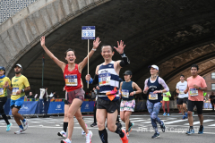 The running of the 50th Anniversary of the New York City Marathon 11/7/21. Thirty thousand runners took to the streets of the 5 boroughs, down from the fifty thousand pre covid. The joy on the faces reflects the end of a long year of covid restrictions.  Copyright Jon Simon .