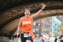 The running of the 50th Anniversary of the New York City Marathon 11/7/21. Thirty thousand runners took to the streets of the 5 boroughs, down from the fifty thousand pre covid. The joy on the faces reflects the end of a long year of covid restrictions.  Copyright Jon Simon .