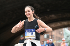 The running of the 50th Anniversary of the New York City Marathon 11/7/21. Thirty thousand runners took to the streets of the 5 boroughs, down from the fifty thousand pre covid. The joy on the faces reflects the end of a long year of covid restrictions.  Copyright Jon Simon .