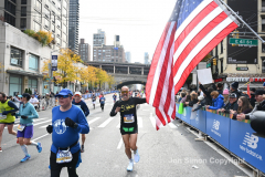 The running of the 50th Anniversary of the New York City Marathon 11/7/21. Thirty thousand runners took to the streets of the 5 boroughs, down from the fifty thousand pre covid. The joy on the faces reflects the end of a long year of covid restrictions.  Copyright Jon Simon .
