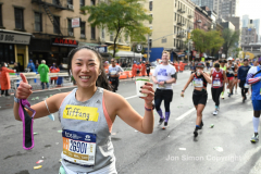 The running of the 50th Anniversary of the New York City Marathon 11/7/21. Thirty thousand runners took to the streets of the 5 boroughs, down from the fifty thousand pre covid. The joy on the faces reflects the end of a long year of covid restrictions.  Copyright Jon Simon .