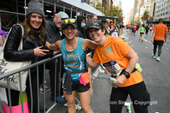 The running of the 50th Anniversary of the New York City Marathon 11/7/21. Thirty thousand runners took to the streets of the 5 boroughs, down from the fifty thousand pre covid. The joy on the faces reflects the end of a long year of covid restrictions.  Copyright Jon Simon .
