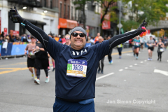 The running of the 50th Anniversary of the New York City Marathon 11/7/21. Thirty thousand runners took to the streets of the 5 boroughs, down from the fifty thousand pre covid. The joy on the faces reflects the end of a long year of covid restrictions.  Copyright Jon Simon .