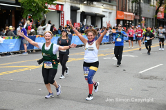 The running of the 50th Anniversary of the New York City Marathon 11/7/21. Thirty thousand runners took to the streets of the 5 boroughs, down from the fifty thousand pre covid. The joy on the faces reflects the end of a long year of covid restrictions.  Copyright Jon Simon .