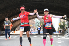 The running of the 50th Anniversary of the New York City Marathon 11/7/21. Thirty thousand runners took to the streets of the 5 boroughs, down from the fifty thousand pre covid. The joy on the faces reflects the end of a long year of covid restrictions.  Copyright Jon Simon .