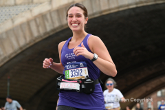 The running of the 50th Anniversary of the New York City Marathon 11/7/21. Thirty thousand runners took to the streets of the 5 boroughs, down from the fifty thousand pre covid. The joy on the faces reflects the end of a long year of covid restrictions.  Copyright Jon Simon .