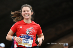 The running of the 50th Anniversary of the New York City Marathon 11/7/21. Thirty thousand runners took to the streets of the 5 boroughs, down from the fifty thousand pre covid. The joy on the faces reflects the end of a long year of covid restrictions.  Copyright Jon Simon .