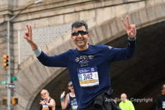 The running of the 50th Anniversary of the New York City Marathon 11/7/21. Thirty thousand runners took to the streets of the 5 boroughs, down from the fifty thousand pre covid. The joy on the faces reflects the end of a long year of covid restrictions.  Copyright Jon Simon .