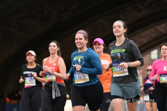 The running of the 50th Anniversary of the New York City Marathon 11/7/21. Thirty thousand runners took to the streets of the 5 boroughs, down from the fifty thousand pre covid. The joy on the faces reflects the end of a long year of covid restrictions.  Copyright Jon Simon .