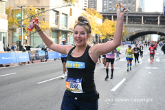 The running of the 50th Anniversary of the New York City Marathon 11/7/21. Thirty thousand runners took to the streets of the 5 boroughs, down from the fifty thousand pre covid. The joy on the faces reflects the end of a long year of covid restrictions.  Copyright Jon Simon .