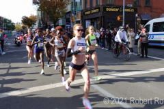 Top women runners race through the Williamsburg section of Brooklyn. Second from right is Peres Jepchirchir of Kenya who finished first.