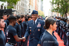 NYC Veterans Day Parade offers up a variety of people, both marchers and spectators 11/11/21.  General Brown congratulates new USAF boot camp recruits.