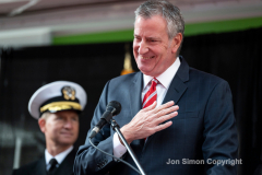 NYC Veterans Day Parade offers up a variety of people, both marchers and spectators 11/11/21.  NYC Mayor De Blasio attends the Veterans Parade.