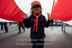 Parade marchers carry a large US flag during the 102nd Annual New York City Veterans Day Parade in New York, New York, on Nov.11, 2021. (Photo by Gabriele Holtermann/Sipa USA)