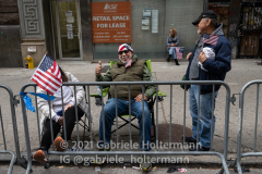 New Yorkers line the street along 5th Avenue for the 102nd Veterans Day Parade in New York, New York, on Nov. 11, 2021. (Photo by Gabriele Holtermann/Sipa USA)