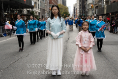 An Asian-American dance group participates in the 102nd Veterans Day Parade along 5th Avenue in New York, New York, on Nov. 11, 2021. (Photo by Gabriele Holtermann/Sipa USA)