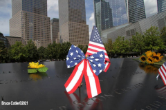 New York, 9.11 20th Anniversary Ceremony held at Ground Zero. Families and Friends gather to hear the names of the victims of the World Trade Center Attack. Families place flowers and photographs on the names of the victims.