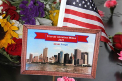 New York, 9.11 20th Anniversary Ceremony held at Ground Zero. Families and Friends gather to hear the names of the victims of the World Trade Center Attack. Families place flowers and photographs on the names of the victims.