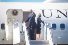 President Joe Biden and First Lady Jill Biden wave good-bye while boarding Air Force One at JFK airport after attending a service at One World Trade Center in NYC to commemorate the 20th anniversary of the tragic event. 
An array of events were scheduled throughout NYC to honor and remember the catastrophe that shook the world in 2001. September 11, 2021 (C)Bianca Otero