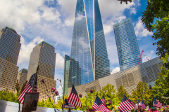 NEW YORK, NEW YORK - SEPTEMBER 11: Flowers are placed into the inscribed names of the victims of the 9/11 attacks and in the 1993 World Trade Center bombing during the annual commemoration ceremony at the National 9/11 Memorial and Museum on September 11, 2021 in New York City. The nation is marking the 20th anniversary of the terror attacks of September 11, 2001, when the terrorist group al-Qaeda flew hijacked airplanes into the World Trade Center, Shanksville, PA and the Pentagon, killing nearly 3,000 people