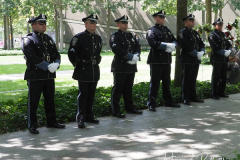 Members of the National Guard observe a moment of silence at the National 9/11 Memorial and Museum during the ceremony commemorating the 20th anniversary of the 9/11 attacks on the World Trade Center, in New York, on September 11, 2021.