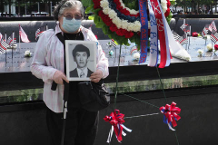 Family members who lost loved ones at the National 9/11 Memorial and Museum during the commemoration the 20th anniversary of the 9/11 attacks on the World Trade Center, in New York, on September 11, 2021