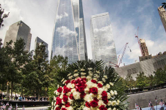 NEW YORK, NEW YORK - SEPTEMBER 11: Flowers are placed into the inscribed names of the victims of the 9/11 attacks and in the 1993 World Trade Center bombing during the annual commemoration ceremony at the National 9/11 Memorial and Museum on September 11, 2021 in New York City. The nation is marking the 20th anniversary of the terror attacks of September 11, 2001, when the terrorist group al-Qaeda flew hijacked airplanes into the World Trade Center, Shanksville, PA and the Pentagon, killing nearly 3,000 people