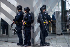 NEW YORK, NEW YORK - SEPTEMBER 11: Members of the NYPD at the conclusion of the commemoration ceremony at the National 9/11 Memorial on September 11, 2021 in New York City. The nation is marking the 20th anniversary of the terror attacks of September 11, 2001, when the terrorist group al-Qaeda flew hijacked airplanes into the World Trade Center, Shanksville, PA and the Pentagon, killing nearly 3,000 people.