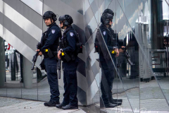 NEW YORK, NEW YORK - SEPTEMBER 11: Members of the NYPD at the conclusion of the commemoration ceremony at the National 9/11 Memorial on September 11, 2021 in New York City. The nation is marking the 20th anniversary of the terror attacks of September 11, 2001, when the terrorist group al-Qaeda flew hijacked airplanes into the World Trade Center, Shanksville, PA and the Pentagon, killing nearly 3,000 people.