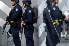 NEW YORK, NEW YORK - SEPTEMBER 11: Members of the NYPD at the conclusion of the commemoration ceremony at the National 9/11 Memorial on September 11, 2021 in New York City. The nation is marking the 20th anniversary of the terror attacks of September 11, 2001, when the terrorist group al-Qaeda flew hijacked airplanes into the World Trade Center, Shanksville, PA and the Pentagon, killing nearly 3,000 people.