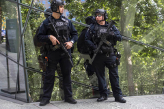 NEW YORK, NEW YORK - SEPTEMBER 11: Members of the NYPD at the conclusion of the commemoration ceremony at the National 9/11 Memorial on September 11, 2021 in New York City. The nation is marking the 20th anniversary of the terror attacks of September 11, 2001, when the terrorist group al-Qaeda flew hijacked airplanes into the World Trade Center, Shanksville, PA and the Pentagon, killing nearly 3,000 people.