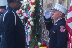 Two Firemen salute each other before relieving the other from duty in front of the FDNY Ten House, located just blocks away from  One World Trade Center in NYC. Thousands of people came to pay their respects and to remember the tragedy that befell NYC 20 years ago. 

An array of events were scheduled throughout NYC to honor and remember the catastrophe that shook the world in 2001. September 11, 2021 (C)Bianca Otero