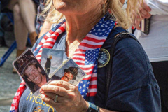 A woman stands in tribute of her son and colleagues who passed in the 9/11 attacks at the 20 year anniversary ceremony that took place at One World Center.

Hundreds of people came to the memorial to pay tribute to their family members and loved ones marking the 20th anniversary of the tragedy that struck NYC and shocked the world on 9/11/01. (C) Bianca Otero