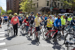 The annual NYC Five Boro Bike Tour exits the FDR Drive and passes through the Upper East Side of Manhattan as it heads to Queens 5/1/22.   Always held on the first Sunday of May, the 40 mile tour has over 30,000 participants. Copyright Jon Simon